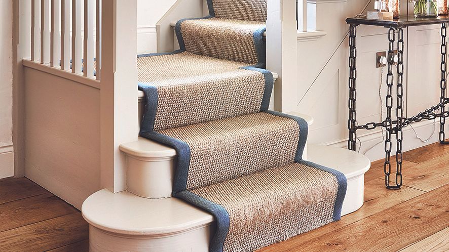 Natural stair runner with a blue bound edge